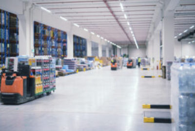 warehouse-industrial-building-interior-with-people-forklifts-handling-goods-storage-area-300x200